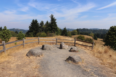 Viewpoint off Summit Lane with large rock seats – natural surface – may have loose gravel
